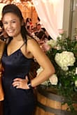 This was perfect! Fits like the model. I wished they made petite sizes. I had to get them hemmed. Overall, lots of compliments and product was very well made. - Inthila S.