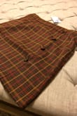 I expected more out of this skirt as it was more expensive than the other plaid skirts that the Lulu's site offers. The fabric was thin and I the zipper gets caught easy. I ordered medium and large to get the perfect fit. I had no issues fitting into a medium while still tucking my shirt in.  I'm a solid 30" waist and athletic build. Medium hit just below my belly button. The length was longer than I expected. Overall it's not a bad skirt, just expected more for the price. Returning both sizes and keeping the two other plaid skirts I ordered from Lulus (which were amazing!) - Paige F.