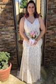 This dress was perfect for my small court wedding. I got sooooo many compliments and people thought I spent hundreds of dollars on it! The fit was wonderful and the train was sooo beautiful. Don't pass this up! Honestly 10/10!! Give it a try! - Kiara M.