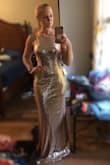 This dress is beautiful. The only downside is the sequins fall off, but it is only noticeable on the ground. The dress is comfortable and beautiful. - Christy H.
