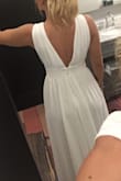 I ended up getting this is the magenta color. But it fits perfect, especially if you have wider hips and a smaller bust. - Ashley S.