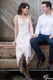 Perfect little white dress. Fit me perfect in every way. I wore it for engagement photos and got countless compliments on it during the time I had it on before the session and after!!! Showing two pictures so you can see how it looks standing and sitting and black and white. Maybe it was the boots that gave it a little "kick" (ha ha!) but I couldn't believe how many compliments were being given. Made me feel really special that day of the pictures and the photos look awesome!!!! So glad I picked up this dress. *I usually wear a 2 or a 0 and I purchased the XS- fits to size well. - Leslie K.