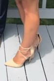 These heels are so cute! They are a bit height but the material of them are really nice and soft! - Megan L.