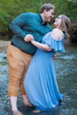 After reading many of the other reviews for this dress, I finally decided to go with it for my engagement photo shoot. I am very hip-y and busty, so the dress was a little tight in those areas; it is also extremely low cut....like extremely. It took several safety pins to get the dress up to what I thought was an acceptable cut for the photos. Other than that though, the dress is literally gorgeous! I have received so many compliments on it, and felt absolutely gorgeous when wearing it. - Kelsey H.