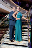 I was looking for a formal dress for a cruise for our anniversary trip. I wanted something different & I wanted a green dress. I wanted green because it's my husband's favorite color and because I wanted to stand out from all the black, red, & silver usual colors for evening wear. This dress exceeded all my expectations. FIT - I was so grateful for all the other ladies & their reviews. It really helped me make a decision on what size to order. The fit was perfect. I selected that it runs a little small only because I can normally wear a medium in dresses that have some stretch & no zipper and I needed to a large in this dress. MATERIAL - The material is a nice heavy fabric that hangs very nicely and flatters the curves & figure.  Also, due to the many different ways the dress can be worn the heavy material is a huge plus for styles that do not allow a bra. It is hand washable & not dry clean which is a great plus for me. The waist band across the back would have been nice to be a little bit wider &with some kind of elastic.  I had a problem with the dress sliding some in the back and the tag sticking out.  Overall though the material is fantastic.
HOW I WORE IT - I blended two of the styles I saw on the ways to wear the dress. I love that this dress can be sexy with as much or little revealing as a lady chooses. I went for a high twist neck in the front and a completely open back. All of the ways to wear it look great and I had a really hard time choosing. Love it! - Paula V.