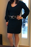 The material is thick and high quality, but not so thick it distorts your shape. It runs a bit large, I ordered a M and it's a bit big, but it's sooooo comfy and it still is fitted enough to give a nice shape, especially with a belt. I'll probably end up buying it in another color, maybe in a smaller size. - Nic V.