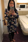 In the pic, I weigh around 128lbs. But 3 weeks ago I was 132lbs, I still fit in that dress size S. I wore that dress in New York City, the weather was windy & cold, so I wore a thin blouse under the dress, and I still look good. The dress does run a little large for size S, and the neck is wide (if I bend down too much, it shows my bra).  It is wrap dress, very easy to wear :) - Annie D.