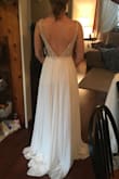Perfection. Feels like such an expensive, great quality dress. It is beautiful. The only size left was 4, do it was too large for me, would have gone with a 2 so probably rubs true to size. Paired with a chiffon shawl cape, added additional bra cups. Buy this dress! - Jennifer B.
