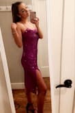 I ordered this in a large and medium to be safe.  It runs just a tad bit loose, so the medium was perfect!!  I got so many compliments, and the color is STUNNING! It hugs all the right places and I did not feel uncomfortable at all.  The leg slit isn't as high as it seems in the model picture, but is just good enough to still make a statement. - Briarman W.
