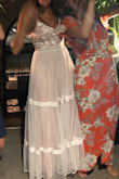 Ordered this for my rehearsal dinner dress and loved it immediately! It's romantic and fun. I did return the SM for an XS because the chest was a little too big on the sides. While I could have gotten it tailored, I ordered the XS to compare. The XS fit perfectly. The adjustable straps are a big plus! - Michelle B.