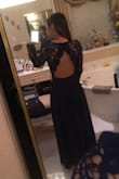 Let me clarify that I had to alter this dress a lot to fit me correctly, but I loved it once it fit me and received many compliments! The waist fit me perfectly, the back was too loose, the length was too long (since I'm only 5 ft.), the sleeves were slightly long, and the v-cut was deeper than I liked since I'm small chested. To solve the v-cut problem, I took the bottom lace lining of my sleeves and sewed them on to make a higher v-cut. I also had to pull the shoulders up. The last thing I did was to sew the back buttons in a different spot to make the back tighter. It was a lot of work, but I thought it was worth it for the dress. - Hallie T.