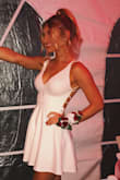 I wore this dress for my senior homecoming and received many many compliments! I did however, needed to get minor alterations in the chest area because when I slouched the top would fold over and it was not flattering. The dress fit perfectly other than that. Breathable material & not see through. Amazing dress for the price. Totally recommend to anyone! - Ashley A.