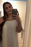 I like this dress and got it in the navy, white and olive. It's really simple and and easy dress to throw on. I do wish the sleeves would stay down better but oh well that's what comes with off the shoulders. I probably could have gone for a medium and been fine too. - Shannon P.