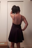 It is super comfy, I bought it back when I was 95lbs and 24" waist. It fit me well back then, and now that I've 'grown' a bit, it fits a bit more snug, but the natural waistline definitely hides any unwanted belly bumps. Super flattering on any figure! I love the back of it and how modest the front is compared to the back. - Nancy L.