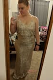 I bought this dress to wear for my rehearsal dinner. I originally bought it in an XL based off my measurements since there were no reviews for this dress at the time. I have a small waist and curvy hips, and I could have made the XL work, but it fit MUCH looser than in the photo. I was hoping for a more form-fitting look, so I ordered the M and L to try on and see. The medium fit me PERFECTLY. The lining is incredibly stretchy, and the sequin material is flowy and luxurious feeling. It is not see through, but I would advise against dark underwear underneath! It's definitely more of a champagne color with silver sequins than a true silver, which is exactly what I was looking for!

The photos are me in the XL (holding the side in, trying to make it fit right), and then me in the medium. Depending on the look you are going for, most people could likely make multiple sizes work! - Nicki P.