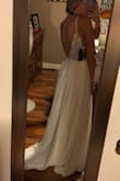 This dress is gorgeous, buy it now! The pictures will never do it justice. I'll be using it for my wedding next summer, I don't think I could of found a more perfect dress for me. I'll have to have it hemmed A LOT, but other than that it's seriously perfect. - Ashley C.