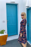 I bought this dress for a fall wedding and wore it in Greece beforehand. The colors turned out beautiful and the fit was perfect, true to size. - Meagan M.