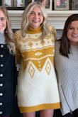 I bought this greed for thanksgiving and absolutely love it. It's super comfortable and flattering. - Madison I.