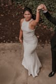 I wore this dress for my pre-wedding photo shoot. It fit true to size for my body, and the fabric is soft and flexible. I got a lot of compliments about this dress. - Chomphunut K.