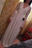 Wow I love this dress. I wish it was a bit smaller - I ordered the x-small but I'm still going to have to take it in at the sides and arms. Some elastic in the lace on the sleeves would go a long way! It feels amazing, really comfortable and light, but it also looks like a wedding dress. I'll probably have to tape the sides/back of the dress to my skin so it holds tight, sew some cups in, and hem it, but for the price I'm just delighted. - Willow W.