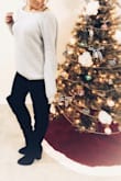 This sweater is thick enough that it keeps you warm but the deep cut out on the back gives it a sexy touch. Can wear it casually or dress it up. Looks cute with a lacy bralette showing. - Joanna F.