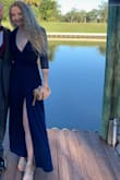 I ordered this for a November outdoor wedding. I thought what will look good and flattering, but keep me somewhat covered - this was it! Wrap dresses look good on everyone and being that this is a true wrap dress you can adjust the leg slit/cleavage to your liking. I only had to be careful sitting down/crossing my legs so that it wouldn't completely fall open. The only downside was I wish it was longer. It only hit the top of my ankles without heels, but then again I'm tall. It was the perfect combination of sexy and subtle. I got so many compliments. - Delaney S.