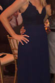 Gorgeous dress wore to Christmas party I saw in one of the reviews the girl added a slit I'm definitely doing that because it will break it up. It's a lot of fabric and I live in 95 degree weather in Florida. - Samanth L.