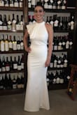 I fell in love with this dress the moment I put it on! The material is thick and holds you in. I was very impressed with the quality of this dress. It was absolutely perfect my wedding rehearsal dinner. I got many compliments while wearing it and everyone wanted to know where I got it from. I can't wait to wear it again some day. - Sarah