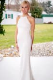 Absolutely loved the dress! Looked much more expensive than all the dresses I saw that were worth much more. There was some give to it (which helped after dinner). So many compliments! Great for any wedding. Had to have it hemmed a little bit, but that's to be expected with any wedding dress. Lovely! - Rosemarie V.