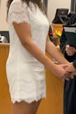 I wore this dress for my civil ceremony. I loved the lace pattern and pretty much everything about this dress. My only complaint is that the dress was a little on the short side. I didn't feel like I could sit or bend over without the dress becoming dangerously short. - Mariah M.