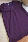 Lovely fitting dress! However, if you're thinking of buying it in Purple - please be aware that the color looks nothing like the beautiful purpley red that's represented in the photo. It's a true basic purple color - kind of boring. - Christina N.