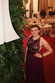 I got this dress for a gala at my work and it was so perfect for the occasion. I absolutely love the color, the top, and the side cutouts with the mesh over them. I received many compliments on this dress and look forward to wearing it again! As other reviewers have said, it does run a little small. The belt line is especially what runs small. The material doesn't allow for any stretch so that part was a little tight but I think a large would have been too big. It was also a little long so I needed to have it hemmed a bit. Overall, I truly love this dress and cannot wait to wear it again! - Anna S.