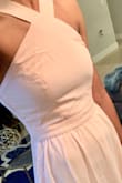 The dress fit perfectly! usually its really hard to find a dress that isn't a little loose under the underarm area but this dress fit like a glove.
Im not a big fan of the color of the dress..I would say the color is NOT peach. when you get the dress, the bag says " pale pink" and thats a better description of the dress. the color of the dress depends on the lighting in the room (it can look white at times)
Overall, I will be wearing this as a bridesmaid, Im hoping for really good lighting at the wedding :)
PS: this dress arrives extremely wrinkled, I recommend a steamer iron to get rid of all the embedded wrinkles. - Rebecca D.