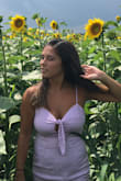 I loved the color but the waist cinched in just a little too far for me. The Medium did not fit as tight but then took away from aspects that the Small had. If the waist was just a little looser it would have flattered me more. - Kayla V.