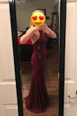 I would not change the size of the dress I ordered, for all intents and purposes it IS true to size. For me, it was slightly too loose in the bust, which I had taken in for alterations and it was AH-MAZING. I had so many compliments. It was comfortable, and snug in the right places. I chose to wear it with adhesive petals and a light body-shaper. There is a kind of rib on each side to keep the fabric close to the skin. It has a slip underneath and a stretchy layer on top so it wasn't thin. And I was warm enough for a December 1st wedding ceremony outdoors in Texas. The only downside is that, for me, the collar was just a wee tight but not uncomfortably or choking me, so I occasionally pulled the dress up to keep it from pulling down. My ONLY regret is not getting a full body shot the day I wore it. So the pictures here are of the day I received it. The hem seems long only because I'm barefoot in the pictures. The day I wore it I was wearing 3 inch heels which was perfect. Super gorgeous- I can't wait to wear it again! - Kira C.