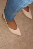 I got these on sale so I definitely got my money's worth. I'd say they're true to size and a staple piece. The color is very neutral, matches with everything and the open back makes them more unique than your everyday flats. The only detail I'd point out is that the pointed tip is pretty long so for me it tends to bend weirdly past where my toes end. It's not a big deal but I do notice it when I'm walking or driving. - Sofia O.