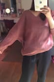 I love the feel and look of this sweater but I feel like I'm swimming in it. It feels like a large and I got the smallest size. Wouldn't return it though, just be aware it's kinda huge. :) - Cristina O.