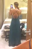 Loved this dress for a wedding in Jamaica. It's got a double layer of fabric which feels high quality and luxurious. The dress is flowy and fun to dance in. I got so many compliments throughout the night. The color is deep forest green. I wore it with nude heels, but switched to black flip flops halfway through! It's got a high-low hemline, and dragged on the floor when I switched to flats. I'm 5'7", so shorter people will have to wear heels with this one. - Shannon M.