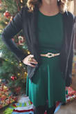 I ordered a medium because I like to make sure my dresses are long enough to squat with my three kids. That's the only reason it was a bit large. I added the gold belt and accessories to break up the green. Perfect dress for the holidays! - Amanda M.