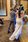 I ordered this dress for my court wedding that I was five months pregnant. I normally wear a small, but I ordered a medium to accommodate my bump. I hemmed the bottom a little and got the straps changed . . Over all the dress was perfect and I would highly recommend. - Briana M.