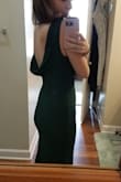 Hey girl hey, you need this dress! I wore to a black tie Christmas party and got compliments all night. The front is sleek and hugged my curves and the exposed back was so sexy! I cant wait to wear it again. Also the back isn't too low so you can still wear your high waisted spanx, and I wore a sticky bra to boost the girls. - Katie F.