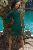 I absolutely loved this dress! It was a different style choice from what I usually wear when I saw it on the Lulus website, but that is why I chose this dress. I was very well pleased with the fit of the dress, glad I chose size extra small. My favorite feature of this dress is the peekaboo lace on the upper thigh region right above the knee. This feature made the dress very sexy . This dress is perfect for a fall wedding, which is where is I chose to wear it. - Tierra A.