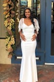First, this dress fit like it was made especially for me!! This was the perfect wedding dress for my intimate courthouse wedding. I could not be any happier with my choice and how beautiful I felt that day. I would highly recommend it!!! - Idil S.