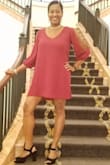 I absolutely love this dress! I brought 3 of them! I can't wait to wear the green one on Christmas. The fit is true to size. (I'm wearing a medium). It's roomy, comfortable, and the length is perfect. I wore my dresses to a wedding and holiday party and I'm still receiving compliments! You'll feel sexy and glamorous as soon as you put it on. You'll definitely turn heads and all eyes will be on you when you wear this dress. - Tesha P.