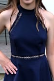 This dress was my homecoming dress. I loved it. The material felt great and it fits true to size. It is a perfect length and is fine to wear without a bra if that's what you are comfortable with!!! I highly recommend this dress for a wedding, homecoming, or any occasion. It is a great dress, Lulus did amazing!!!!!! - Melanie H.