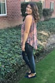 The material is very lightweight and flowy. The fit is loose so there's lots of room if you have hips or a big chest. I have worn it with a bralette and no bra (bras can show because it is low cut in the armpit) but very cute! Shoes are Lulus as well. - Kami C.
