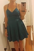 This dress is super cute. I was looking for a full skirt for Christmas dinner. Paired this little dress with a black and white crop top I found on Lulus to keep me warm :) the dress is good quality and sits just above the knee. The skirt had just the right amount of 'poof'. - Nicole H.
