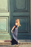 This dress is sweet and sexy at the same time! It fits every curve perfectly, hugging at all the right places. The slit is a little high, but it's manageable. I love it so much that I considered getting another in a different pattern! - Kelli K.