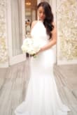 I used it as my wedding dress! Loved it. The dress is comfortable. I ordered a medium because I did not want it to be too tight. I used a no-show underwear and a silicone gel petals and it was perfect, nothing showed. The dress is lined, this avoids a see through look. Overall, it's an simple but elegant and sophisticated dress. - Carolina R.