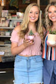 This off the shoulder top is adorable! I love the tie in the front and the ruffles on the sleeves. It's a really pretty soft pink that's perfect for the summer. - Taylor H.